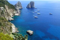 Capri: Boat Tour & Swimming Stop + Roundtrip from Naples