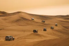 Dubai: Premium Sunset Safari, Quad Bike, Sandboard + BBQ Dinner