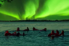 Lake View of Northern Lights with Floating Suit